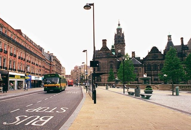 Buses travel along Pinstone Street, Sheffield, in August 1999