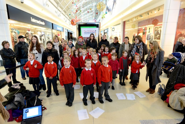 Pupils, staff and parents from Barnes Infants were singing festive songs in The Bridges in this photo from seven years ago.