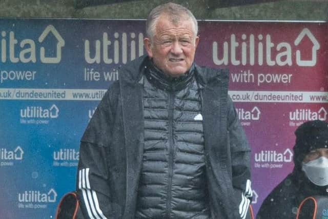 Sheffield United manager Chris Wilder braves the elements at Tannadice: Mark Scates / SNS Group