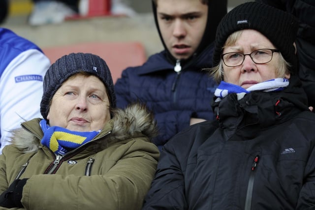 Two Sheffield Wednesday fans well wrapped up for an away day at Oakwell in February 2018