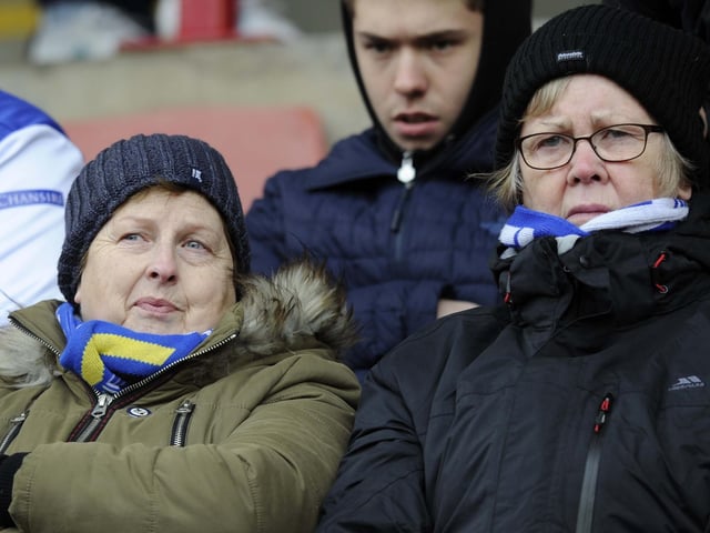 Two Sheffield Wednesday fans well wrapped up for an away day at Oakwell in February 2018