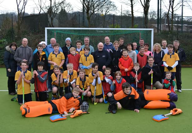 Some of Buxton HC's young players and their parents in 2014.