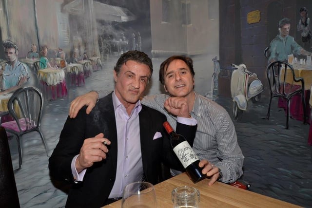 Sylvester Stallone is seen here with Maurizio Mori in Nonna's restaurant on Ecclesall Road in 2015 - he had just appeared at Sheffield City Hall for an 'audience with' event.