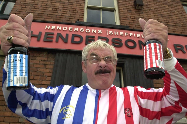 The late Bobby Knutt, comedian and actor, showing his allegiance to the red and white sides of Sheffield as Henderson's Relish released new-style bottles to commemorate a derby game in 2000