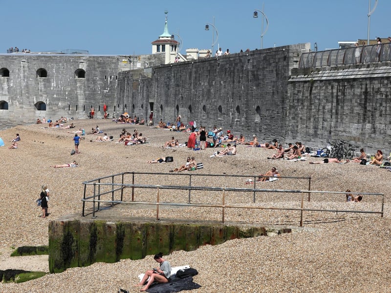 Beach revellers gather at the Hot Walls in Old Portsmouth.