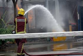 File picture shows South Yorkshire firefighters dealing with a blaze. Crews were sent to a fire on Sharrow Street, Highfield, and a man had to be taken to hospital