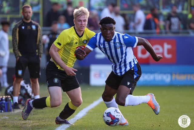 Sheffield Wednesday remain in contract negotiations with Fisayo Dele-Bashiru amid interest from the Championship. Credit: Harrogate Town FC.