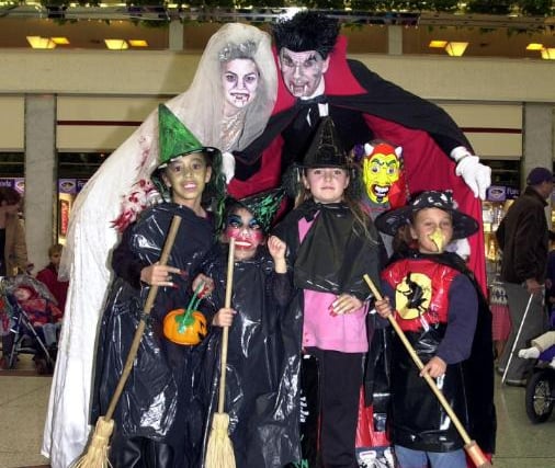 Dracula and his bride with trick or treaters in 2001.