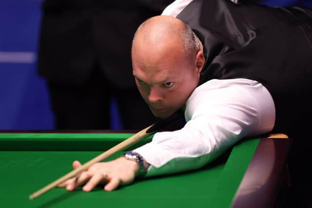 Stuart Bingham of England plays a shot during the Betfred World Snooker Championship Round Two match during day nine of the Betfred World Snooker Championships 2021 at The Crucible, Sheffield. Picture date: Sunday April 25, 2021. Photo George Wood/PA Wire