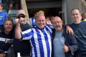 Sheffield Wednesday supporters enjoy the atmosphere at Plymouth's Home Park.