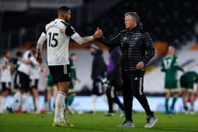 Chris Wilder, manager of Sheffield United interacts with Ruben Loftus-Cheek of Fulham after the Premier League match between Fulham and Sheffield United at Craven Cottage on February 20, 2021.