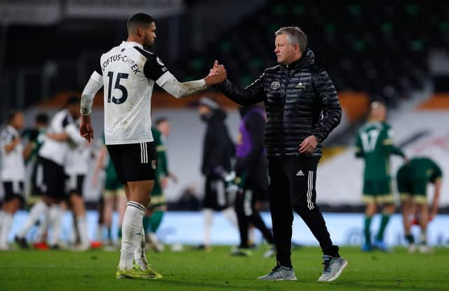 Chris Wilder, manager of Sheffield United interacts with Ruben Loftus-Cheek of Fulham after the Premier League match between Fulham and Sheffield United at Craven Cottage on February 20, 2021.