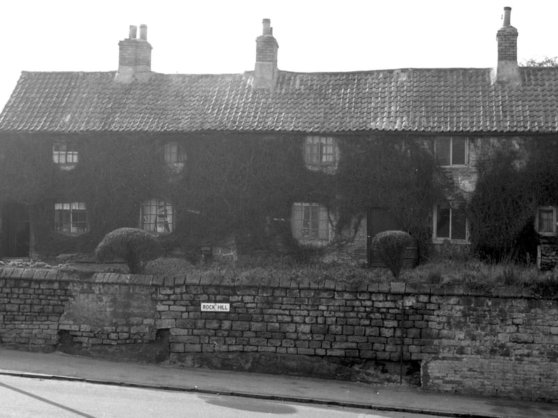 The cottages, which no longer stand, pictured in the sixties.