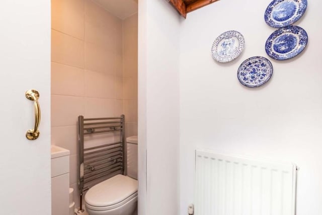 The ground floor of the Pinxton property is completed by this compact shower room and WC