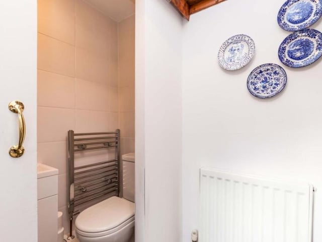 The ground floor of the Pinxton property is completed by this compact shower room and WC