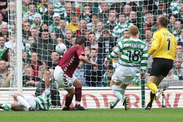 Rudi Skacel scores as Hearts fight back from an early opener to earn a draw at Parkhead. The league-leaders give as good as they get in what would prove to be George Burley's last game as manager.