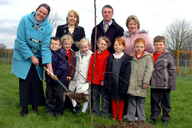 In 2007 Reverend Mary Gregory and pupil Joshua Holloway, aged six, planted a tree at Hatfield Travis Infant and Nursey School watched by, back row, from left, head Liz Hallett, Steve Presley, of Doncaster Healthy Schools, and teacher Val Simms, Hatfield Travis's Healthy Schools co-ordinator; front, from left,  pupils Paige Crossley, Caitlin Ashmore, India Lefeve-Firbank, Amy baker, Jodie Johnson and Lewis Clark, all aged six.