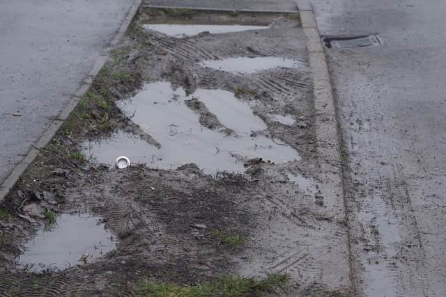 Simon Dell has been told to remove stones placed on grass verges in Hackenthorpe, Sheffield,  to stop cars churning them into mud