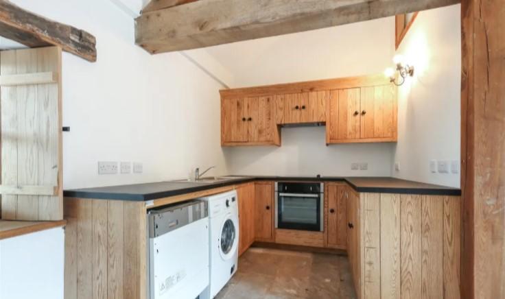 The property has a separate utility room leading off the kitchen.