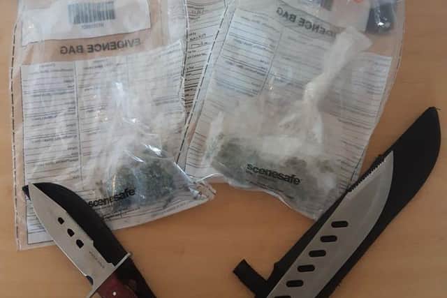 Police seized cannabis and knives while carrying out a drugs warrant at a property in Page Hall