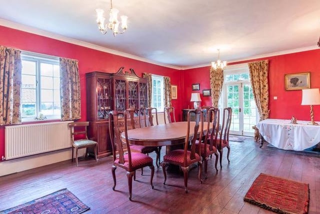 Imagine sitting down to dinner in this elegant dining room. It even has access to the garden.