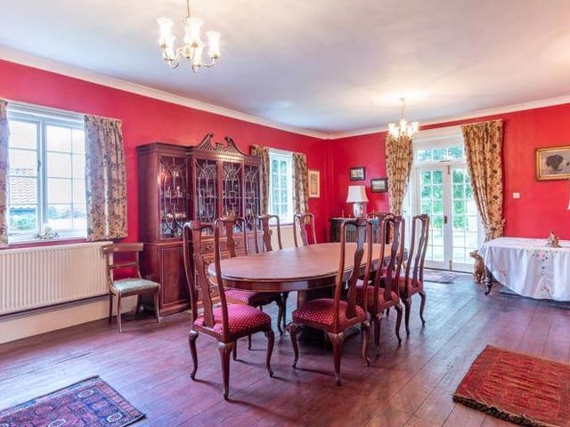 Imagine sitting down to dinner in this elegant dining room. It even has access to the garden.