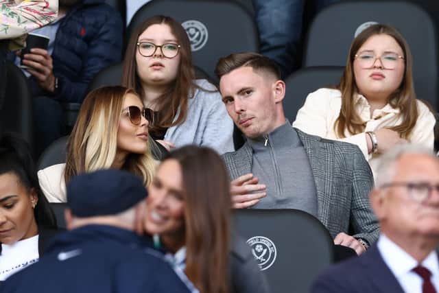 Former Sheffield United player Dean Henderson watches the first leg of their Championship play-off semi-final against Nottingham Forest from the directors' box at Bramall Lane: Darren Staples / Sportimage