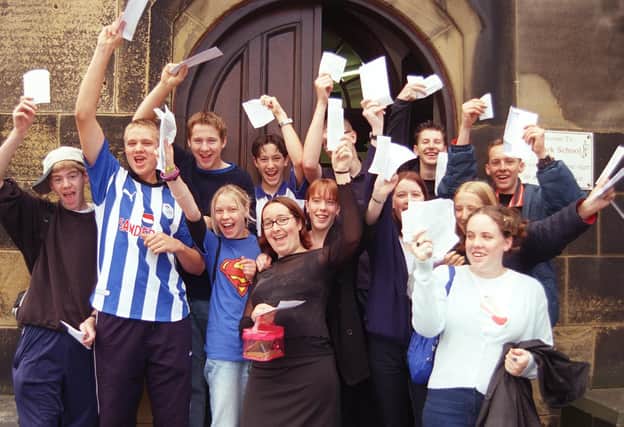 Pupils celebrate at Firth Park school after getting their GCSE results in the summer of 1999.