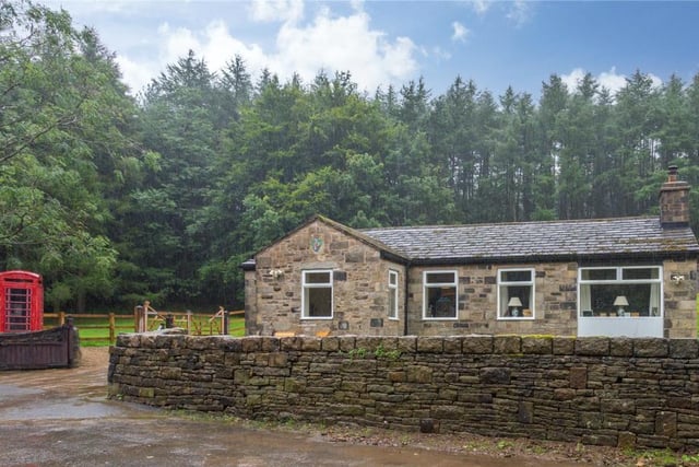This four bedroom bungalow in Glossop is listed for £650,000.