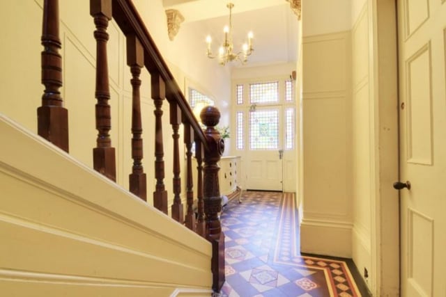 The impressive entrance features a  grand staircase leading to the first floor. 
Image by Peter Heron/ Zoopla.