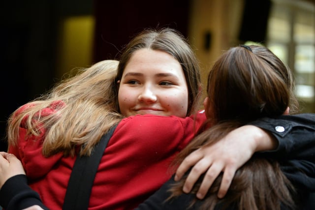 McAuley School pupils embrace on thier last day. Picture: NDFP-20-03-20 McAuleyLeaversParty 7-NMSY