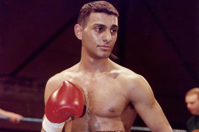 Naseem Hamed salutes his victory over Belgian John Mecheli at Mansfield Leisure Centre, April 1994. Getty images