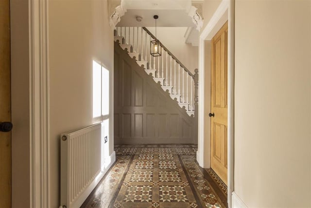 The striking tiled floor catches your eye as soon as you walk into the property.  A staircase rises to the first floor accommodation and a second staircase descends down into the cellar.