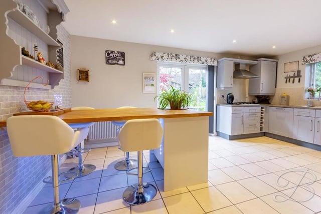 The kitchen is a delightful room in its own right. But it also has French doors leading out to the back garden.