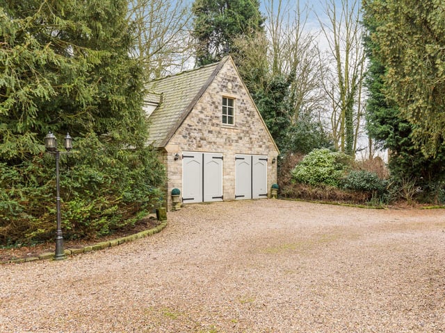 The double garage has a upstairs room.