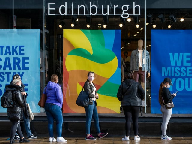A poster in the window of Primark told customers to "take care" and "stay safe".