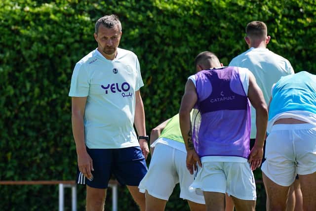 Slavisa Jokanovic speaks to his players on their pre-season camp in Spain (Sheffield United)