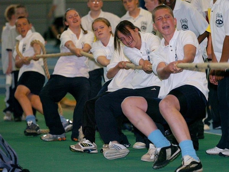 Pupils take the strain in the tug-of-war at the All Saints School sports day (June 2005)