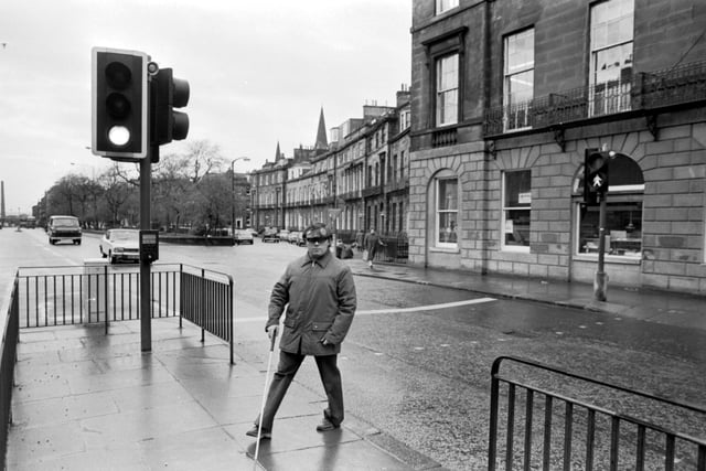 James McCafferty, the Edinburgh secretary of the National League for Blind and Disabled, at Britain's first talking road crossing, installed at Shandwick Place in November 1980.