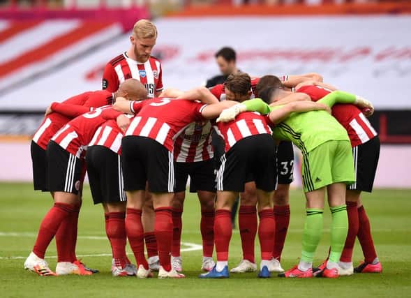 Sheffield United players get together just before kick off in their match against Tottenham at Bramall Lane. (Photo by Oli Scarff/Pool via Getty Images)