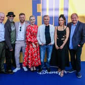 The cast of The Full Monty re-unite in Sheffield for the premiere of the new Disney+ TV version of the film. Pictured are Steve Huison (Lomper), Paul Barber (Horse), Wim Snape (Nathan), Lesley Sharp (Jean), Robert Carlyle (Gaz), newcomer Talitha Wing, who plays Gaz's daughter Destiny, and Mark Addy (Dave)