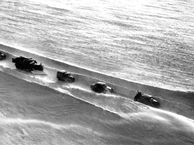 Aerial view showing the progress of a snowplough being halted by stranded vehicles on the A7 between Ashkirk and Hawick