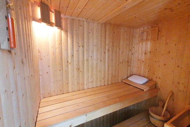 There is a sauna next to the WC and utility area.