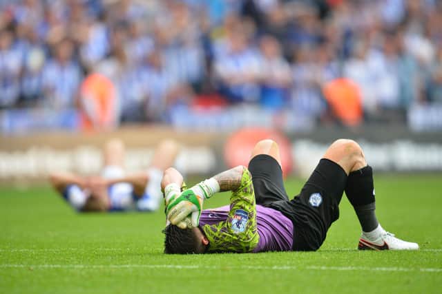 Sheffield Wednesday's Keiren Westwood reacts after the final whistle during the English Championship play-off final football match between Hull City and Sheffield Wednesday at Wembley Stadium in London on May 28, 2016. (GLYN KIRK/AFP via Getty Images)
