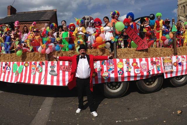 A ringmaster and circus characters at the Headland Carnival parade in 2015.