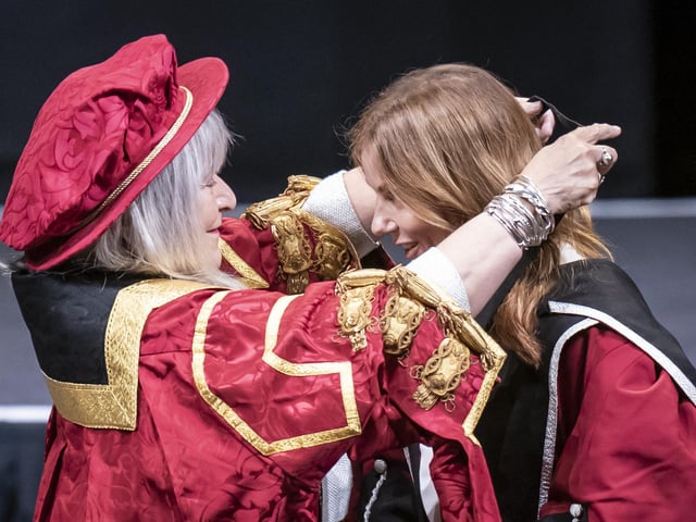 Chancellor of Sheffield Hallam University Baroness Helena Kennedy (left) presents Geri Halliwell-Horner (right) with an honorary doctorate from Sheffield Hallam University at Ponds Forge International Sports Centre in Sheffield. Picture date: Tuesday November 22, 2022.