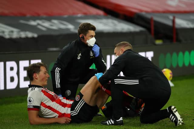 Sander Berge suffered a serious hamstring injury during Sheffield United's match against Manchester United at Bramall Lane earlier this season: Simon Bellis/Sportimage