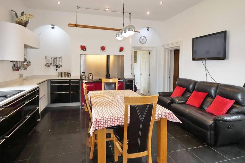 The property boasts a modern, fitted kitchen.