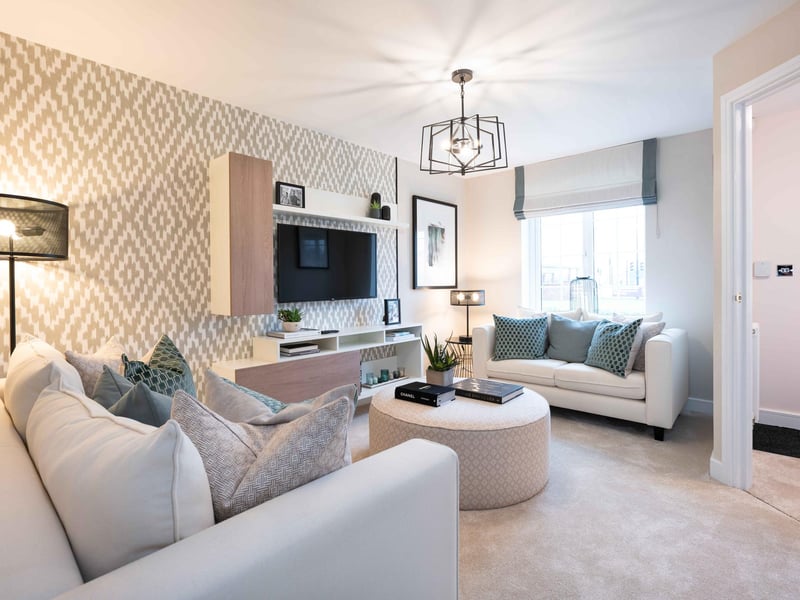 Spacious lounge with windows overlooking the front of the property