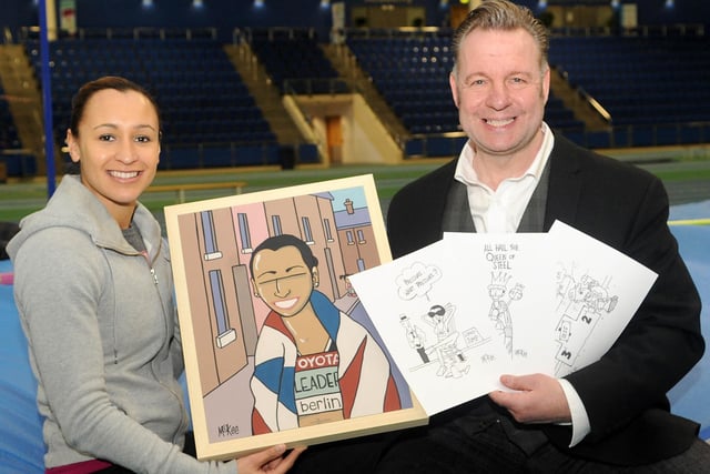 Sheffield Olympic athlete Jessica Ennis with artist Pete McKee. Jess From the Block is one of several paintings featuring the champion heptathlete - Pete did sports cartoons in his early career, including for the Sheffield Telegraph
